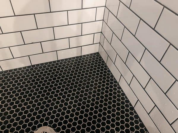 Contrast the White Tiles With Black Grout