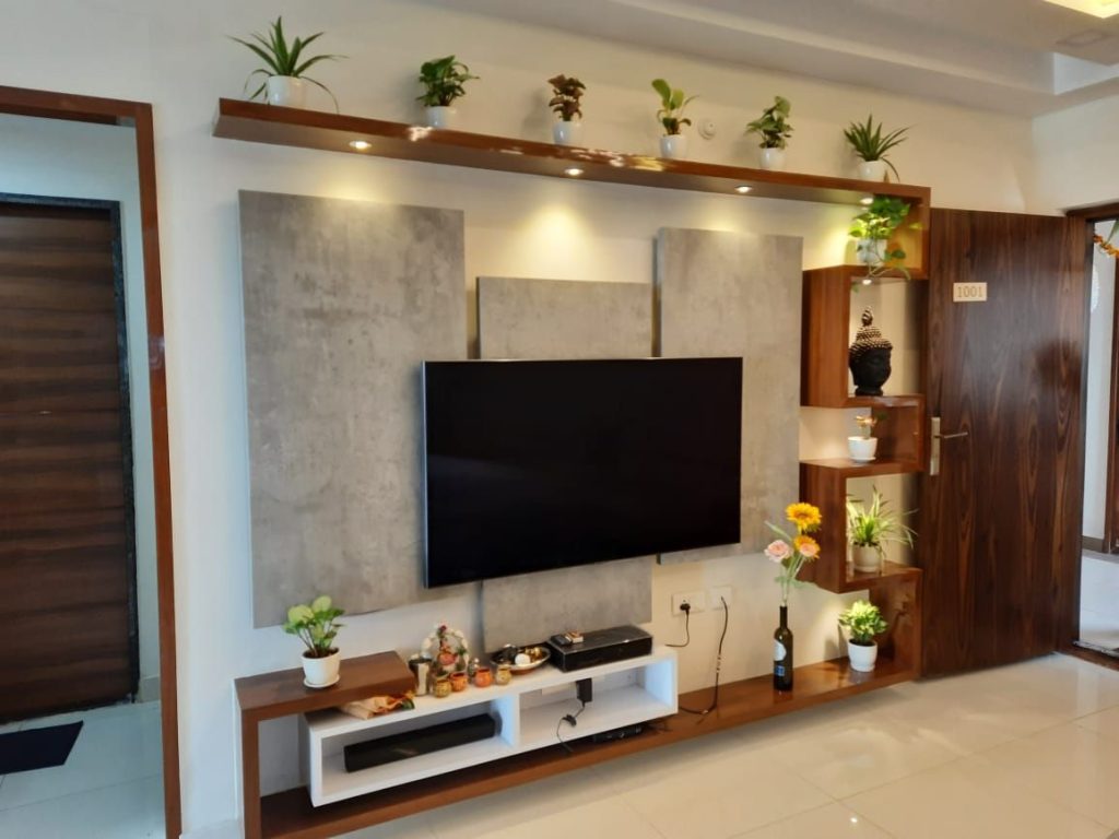 TV Frame and a Vase of Foliage