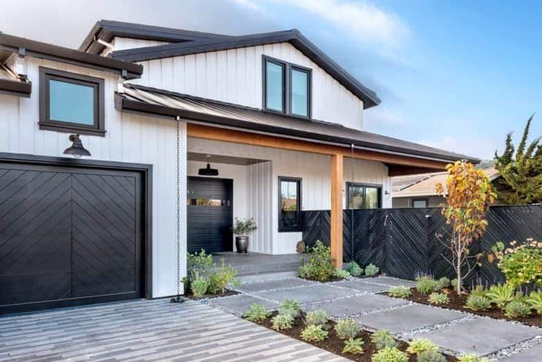 White Wooden House Upgraded with Black Trim