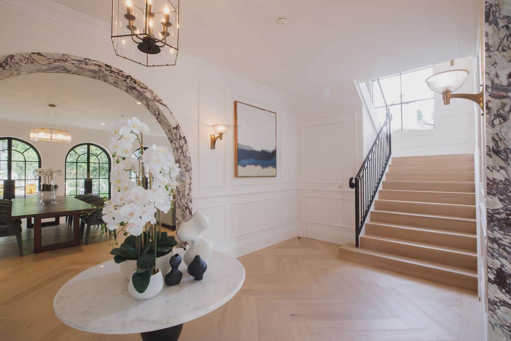 An Arched Doorway and White Wainscoting