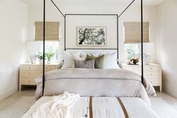 Brown King Canopy Bed with White Drapes