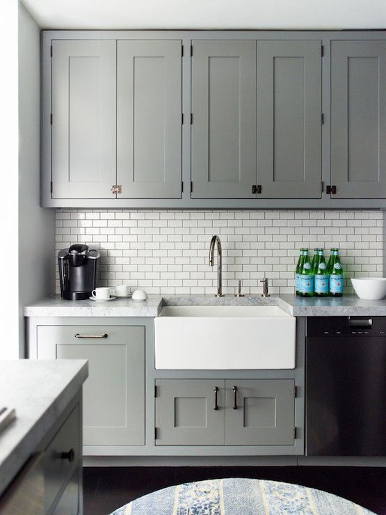 Light Grey Cabinets and a White Subway Tilebackboard
