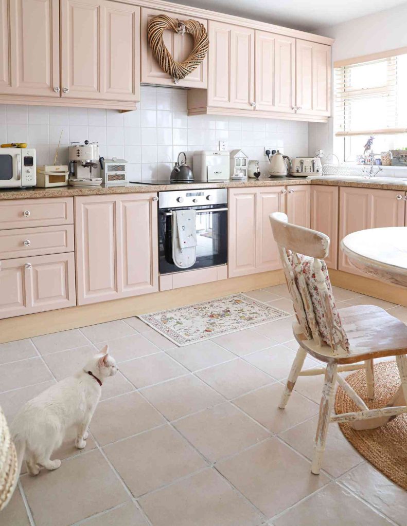 Light Pink Cabinets and White Tile