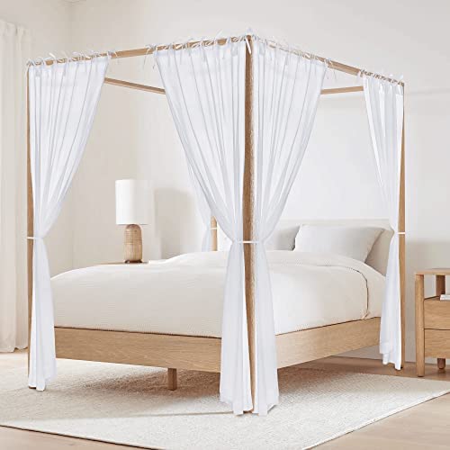 White Metal Canopy Bed with Sheer White Drapes