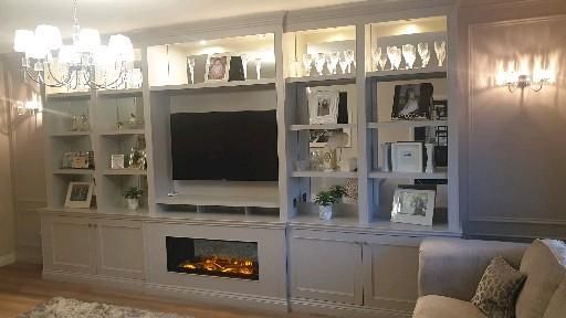 Fireplace Wall with TV and Display Cabinets