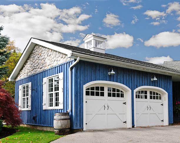 Garage with Blue and White Frontage
