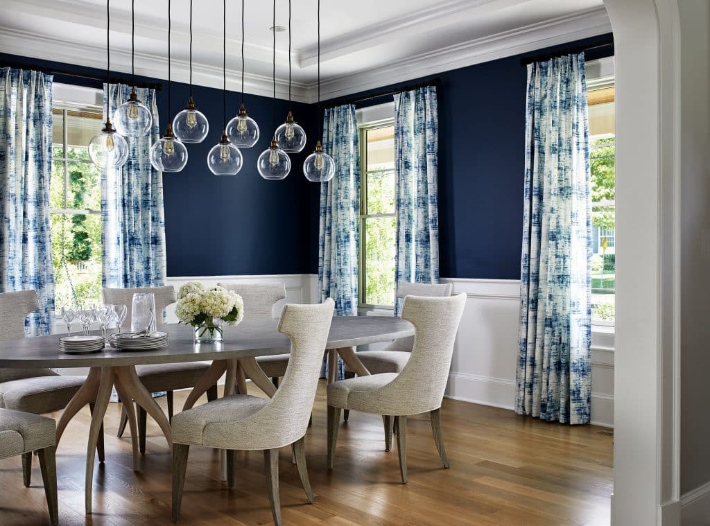 Navy Walls With White Dining Room Wainscoting