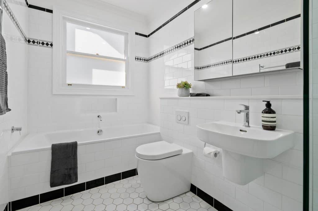 Ornate Tile in a White Bathroom