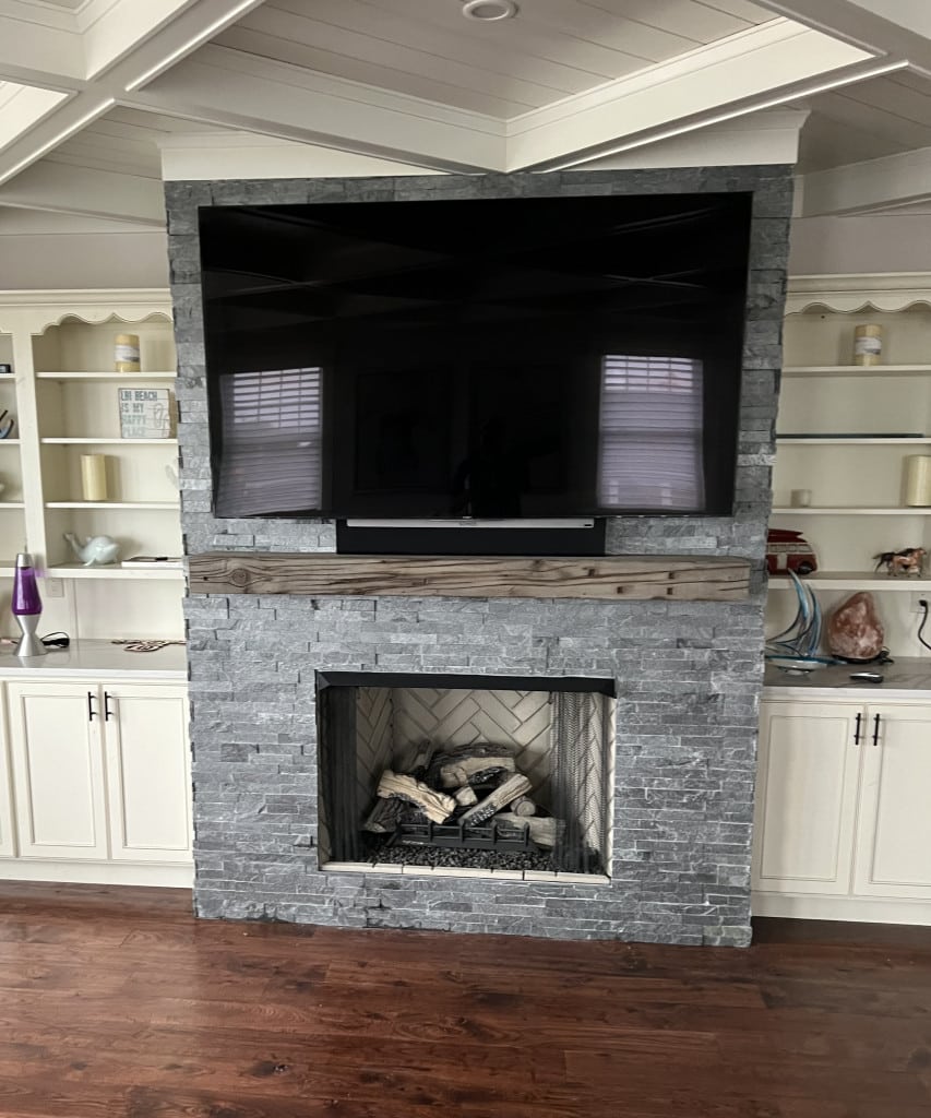 Stone Fireplace Wall with Integrated TV