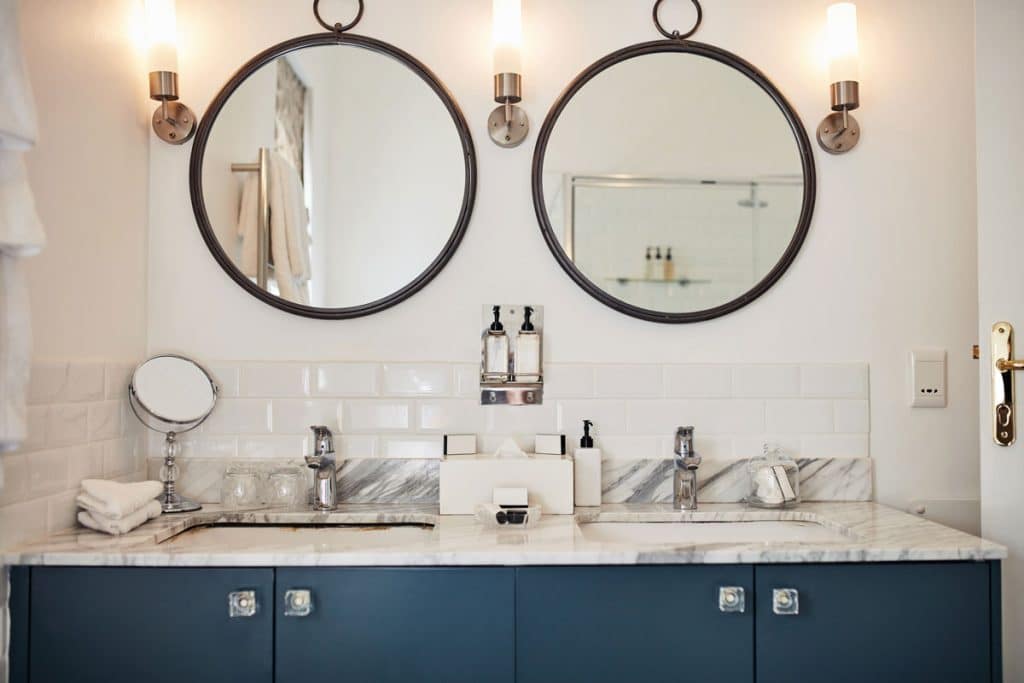 White Bathroom Walls and Chrome Faucets
