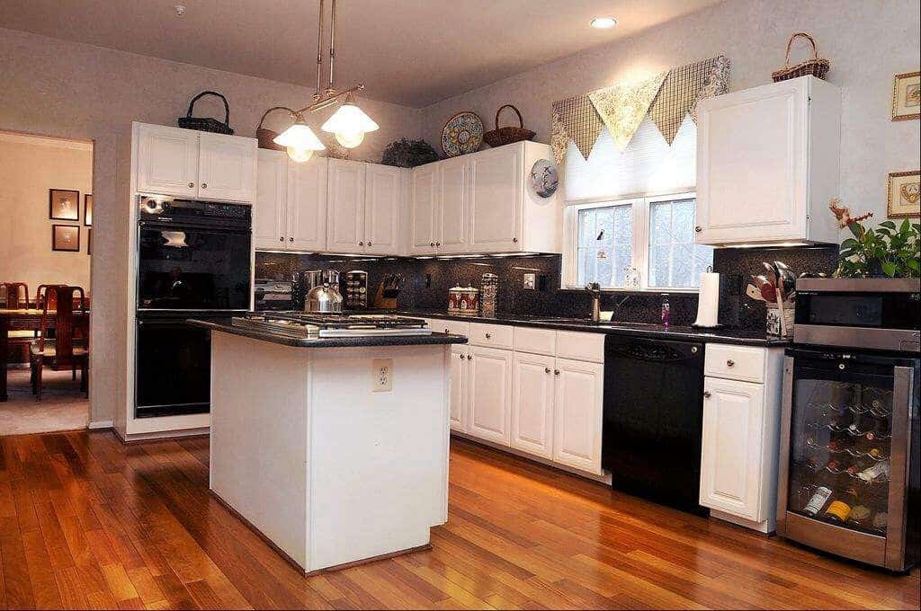 White Cabinets with Black Appliances