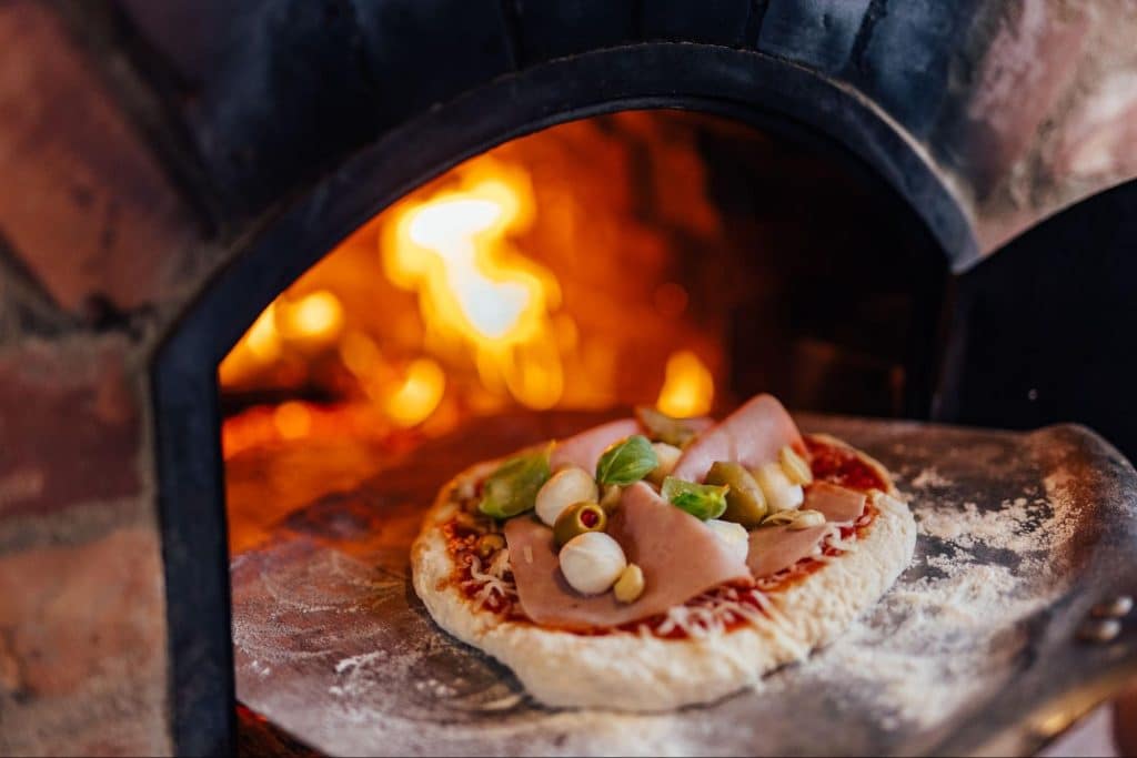 cooking pizza in a portable oven