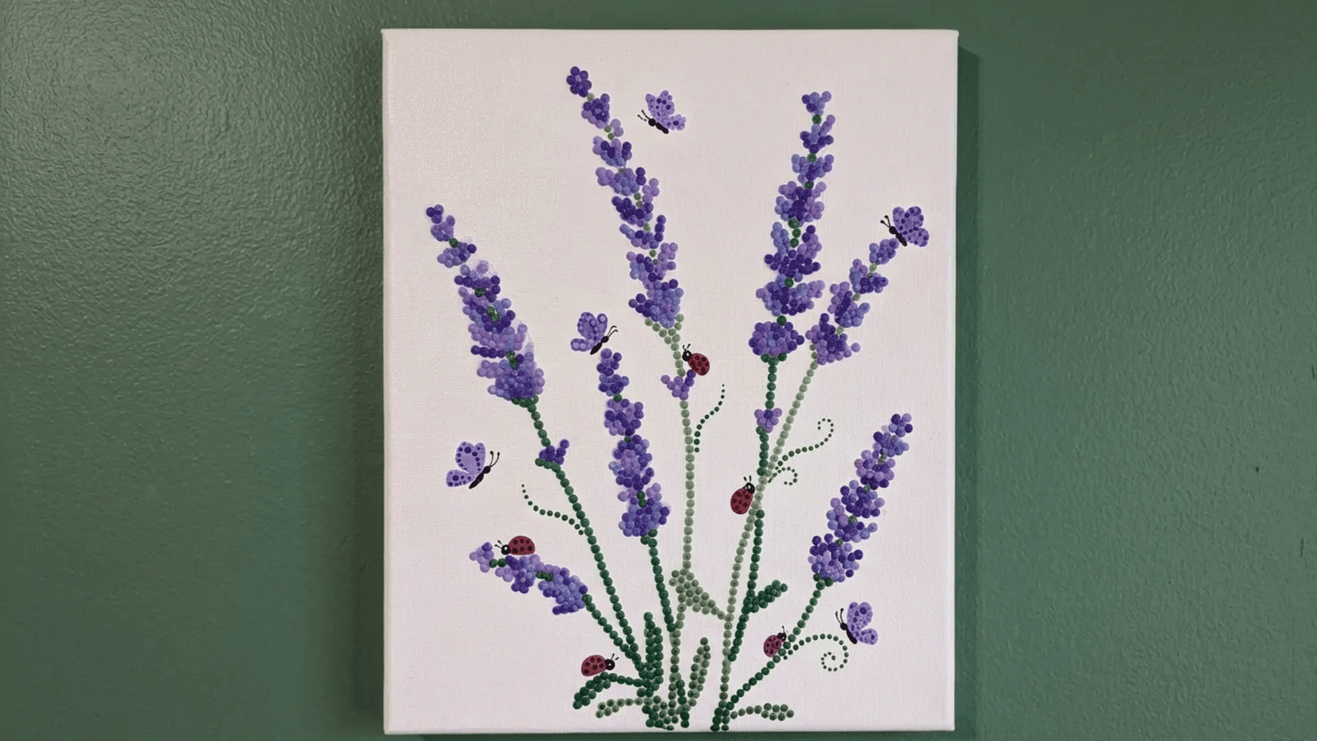 A dotted lavender flower canvas painting with purple blossoms, tiny butterflies, and ladybugs on a clean white background.