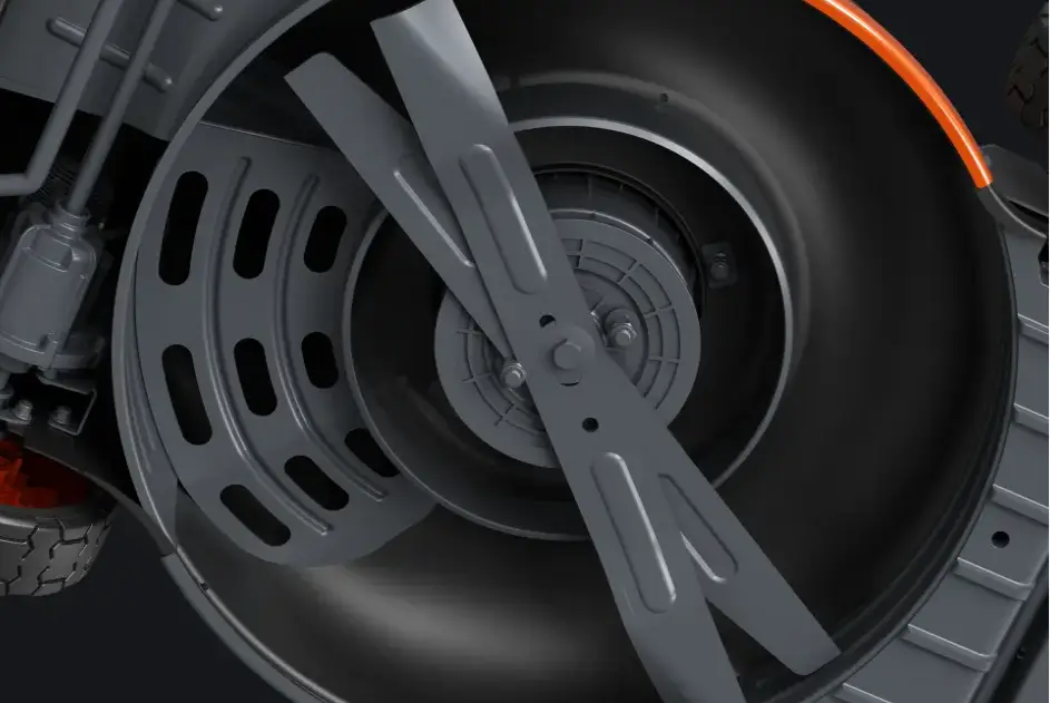 Close-up of metal lawnmower blade and wheel assembly with black and silver components