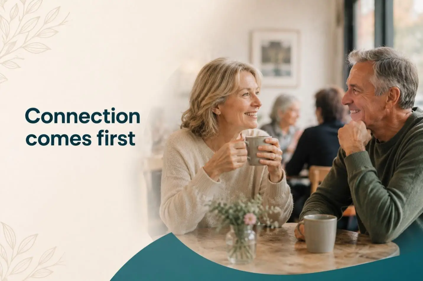 Older couple enjoying coffee together in cozy cafe with natural light and floral decor