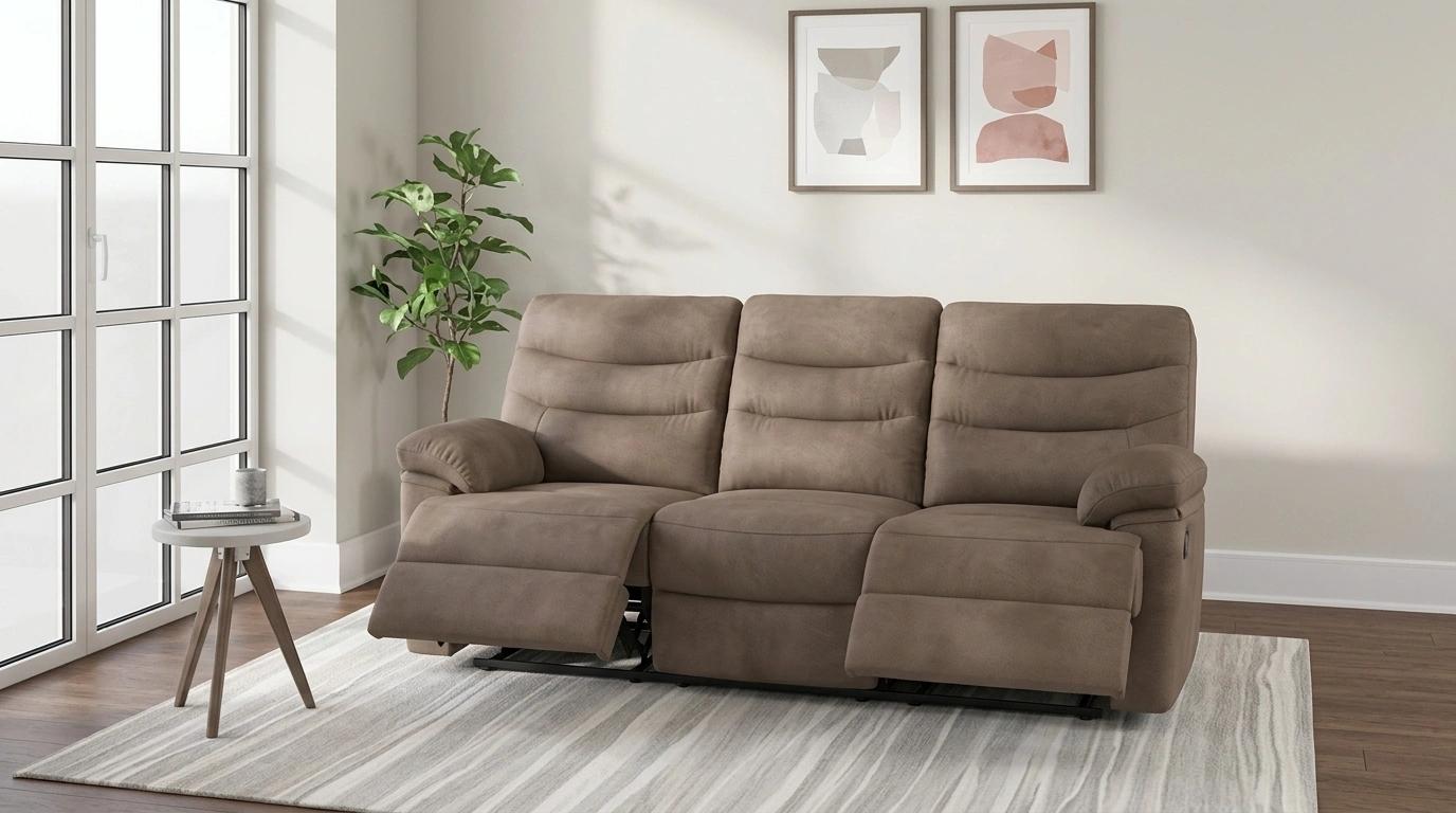 Reclining sofa partially extended in cozy media room with warm lighting and modern decor.