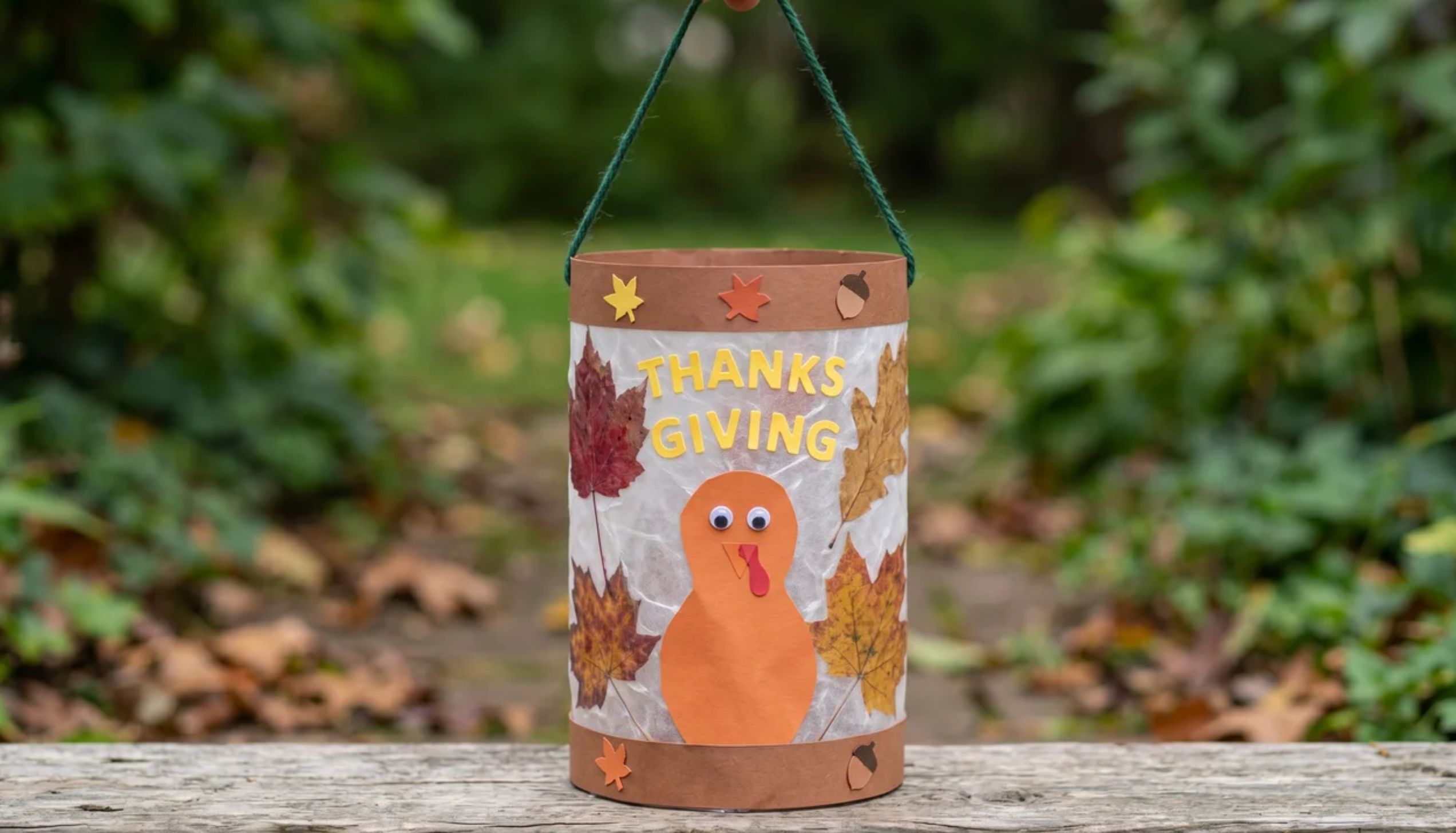 A handmade paper lantern featuring a turkey and leaves, great inspiration for easy thanksgiving crafts.