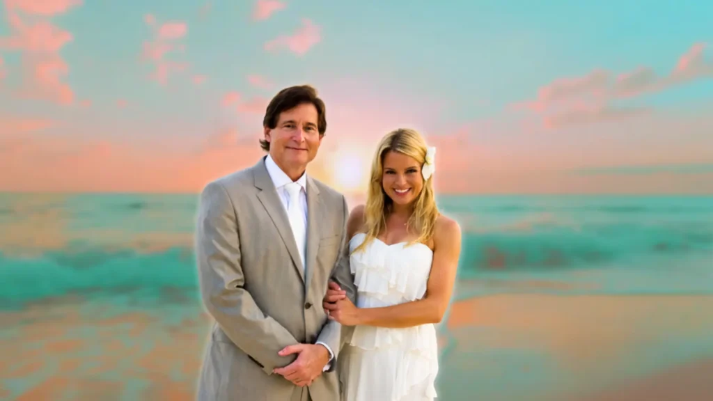 Greg Henderson and Pam Bondi at beach engagement in Cayman Islands during sunset.
