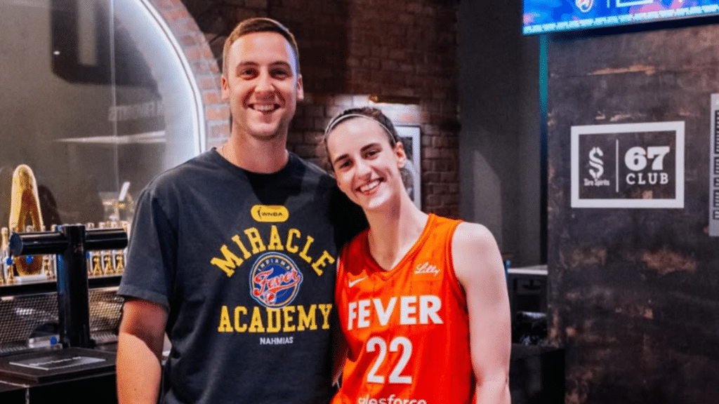 Caitlin Clark with her boyfriend Connor McCaffrey wearing Indiana Fever shirts.