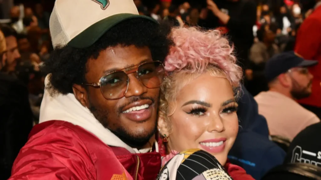 DC Young Fly and Jacky Oh together in a candid couple portrait showing their relationship and public life as partners.