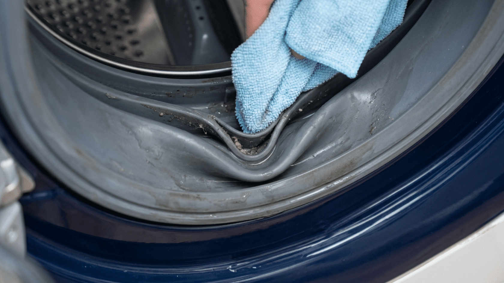 Cloth cleaning rubber gasket folds inside front load washing machine door