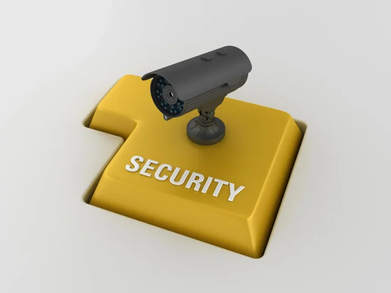 Security camera on yellow key-shaped button labeled 'Security' in a 3D render