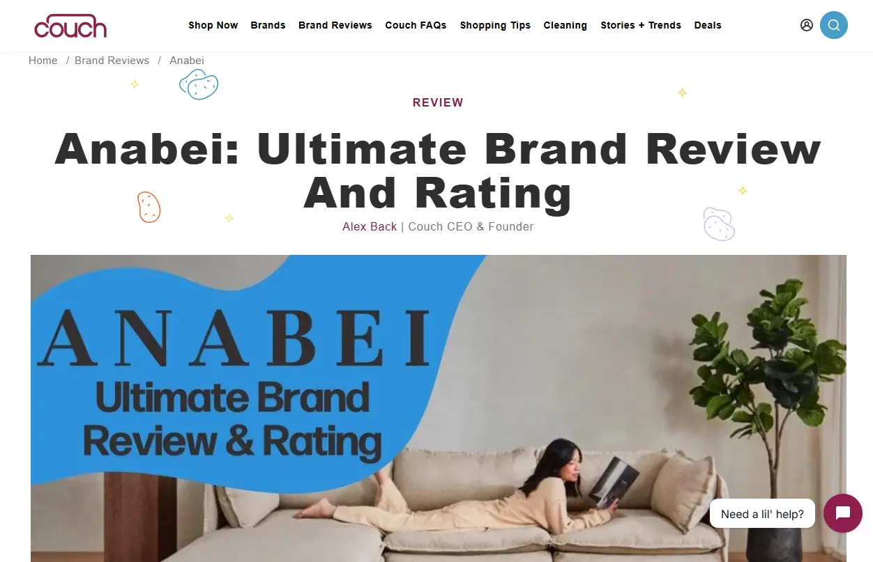 Woman reading on beige couch next to indoor plant in modern living room