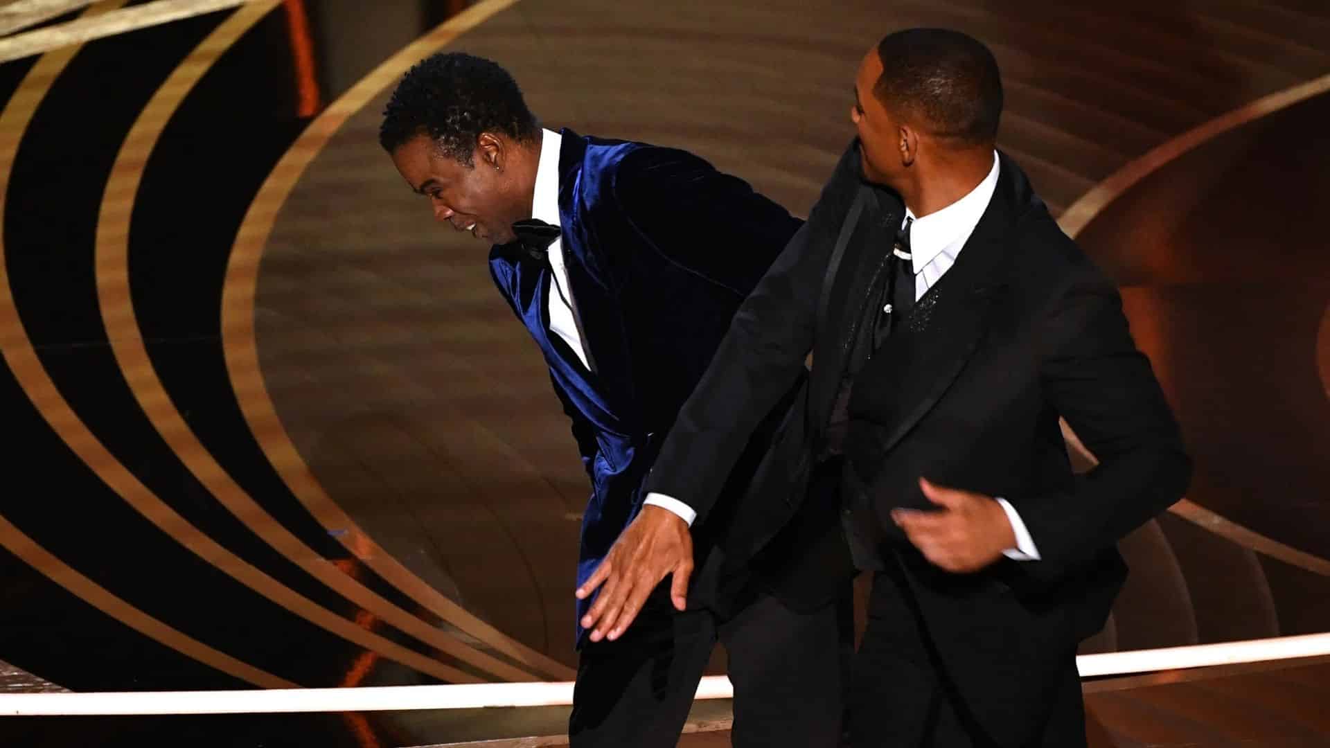 Chris Rock and Will Smith during the 2022 Oscars incident that affected Rock's career visibility