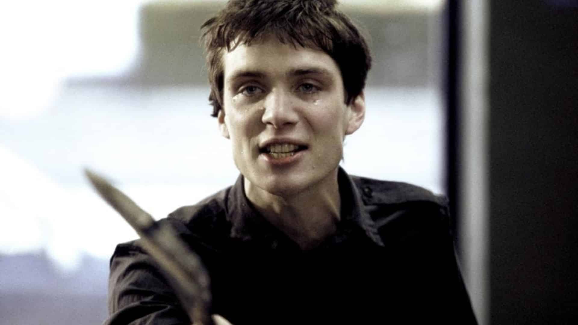 Young Cillian Murphy performing in an early acting role during his theater career.