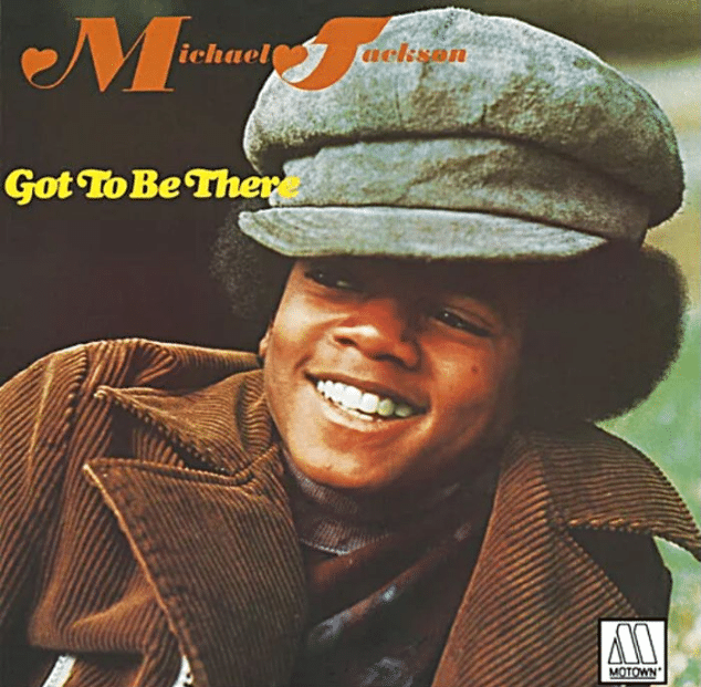Got to Be There album cover featuring Michael Jackson wearing a cap and smiling in a vintage portrait.