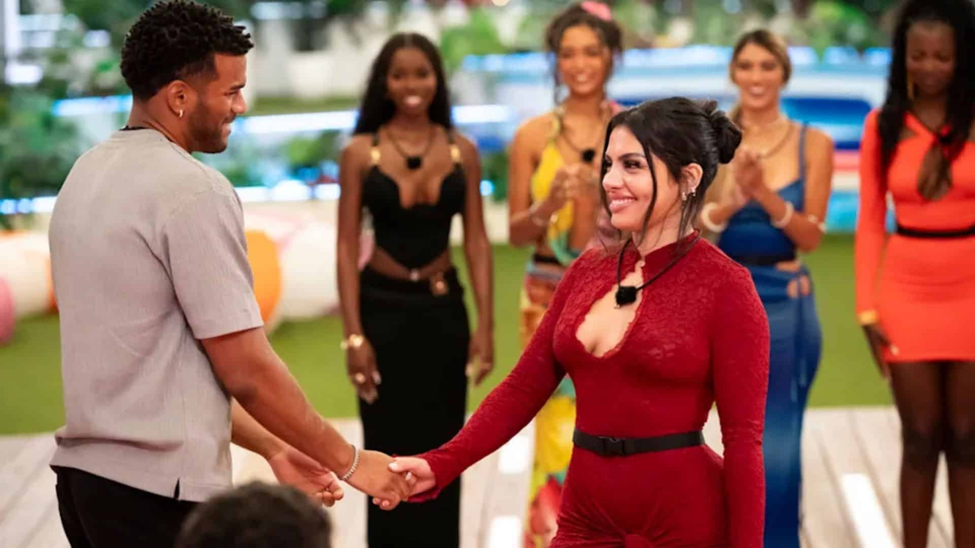 Huda Mustafa holds hands with jeremiah brown on Love Island USA Season 7.
