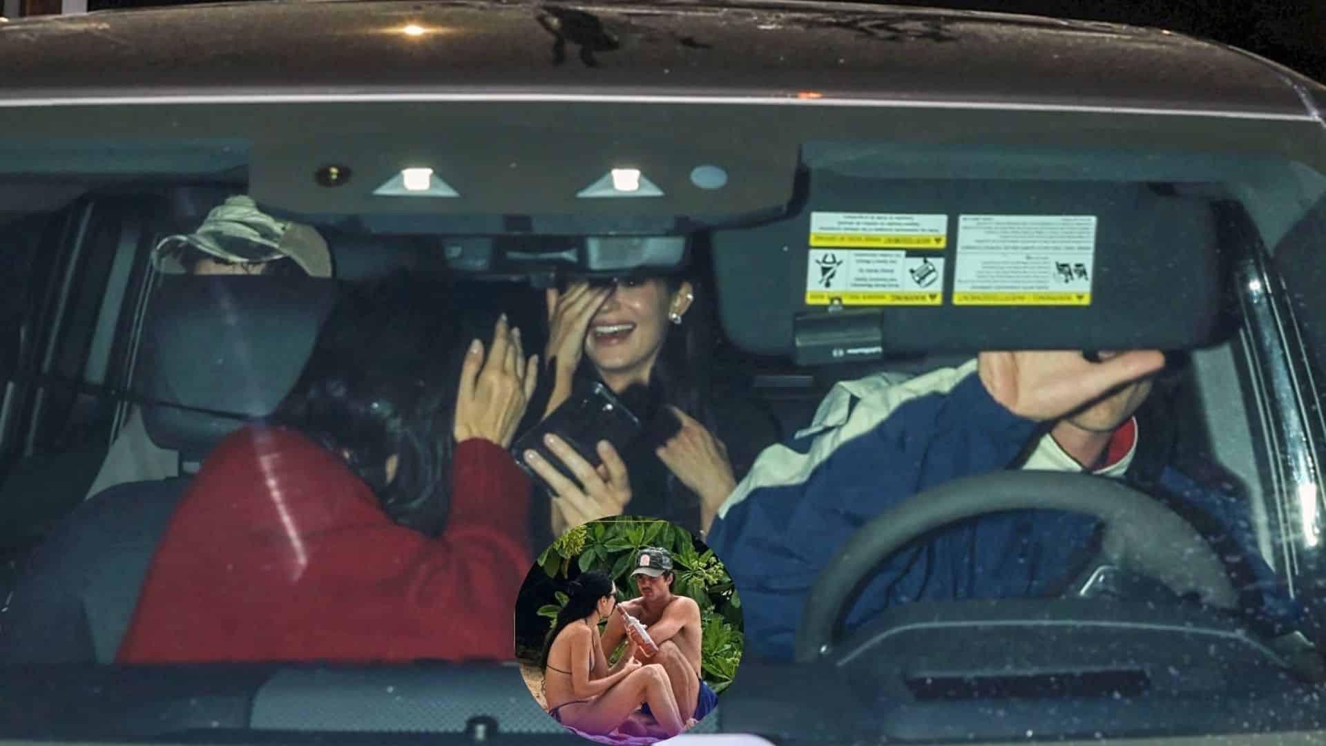 Kendall Jenner in a car shielding her face next to Jacob Elordi, with an inset of them on a beach.