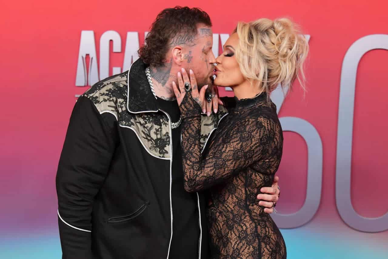 Jelly Roll and Bunnie XO attending an event together, highlighting their public relationship before their divorce.