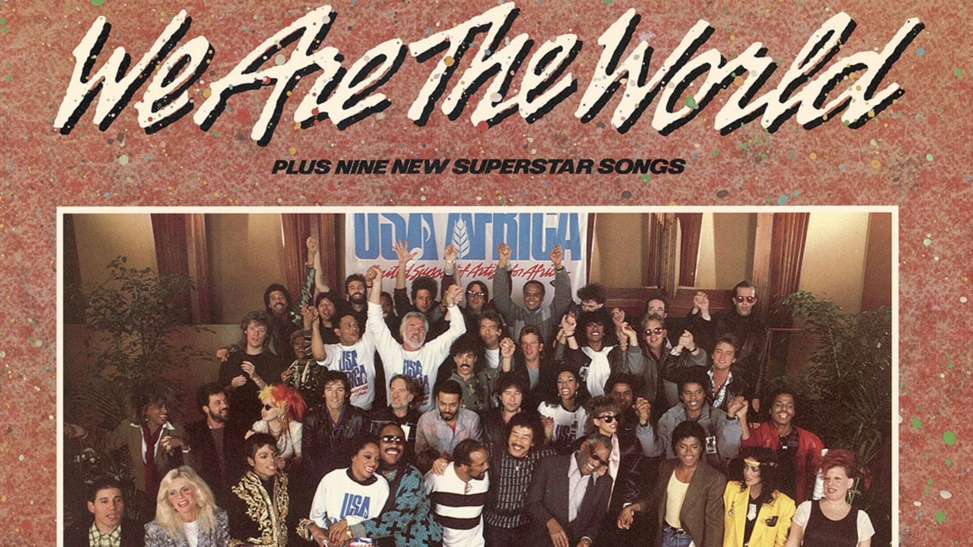 Large group of musicians gathered for a charity music recording event.