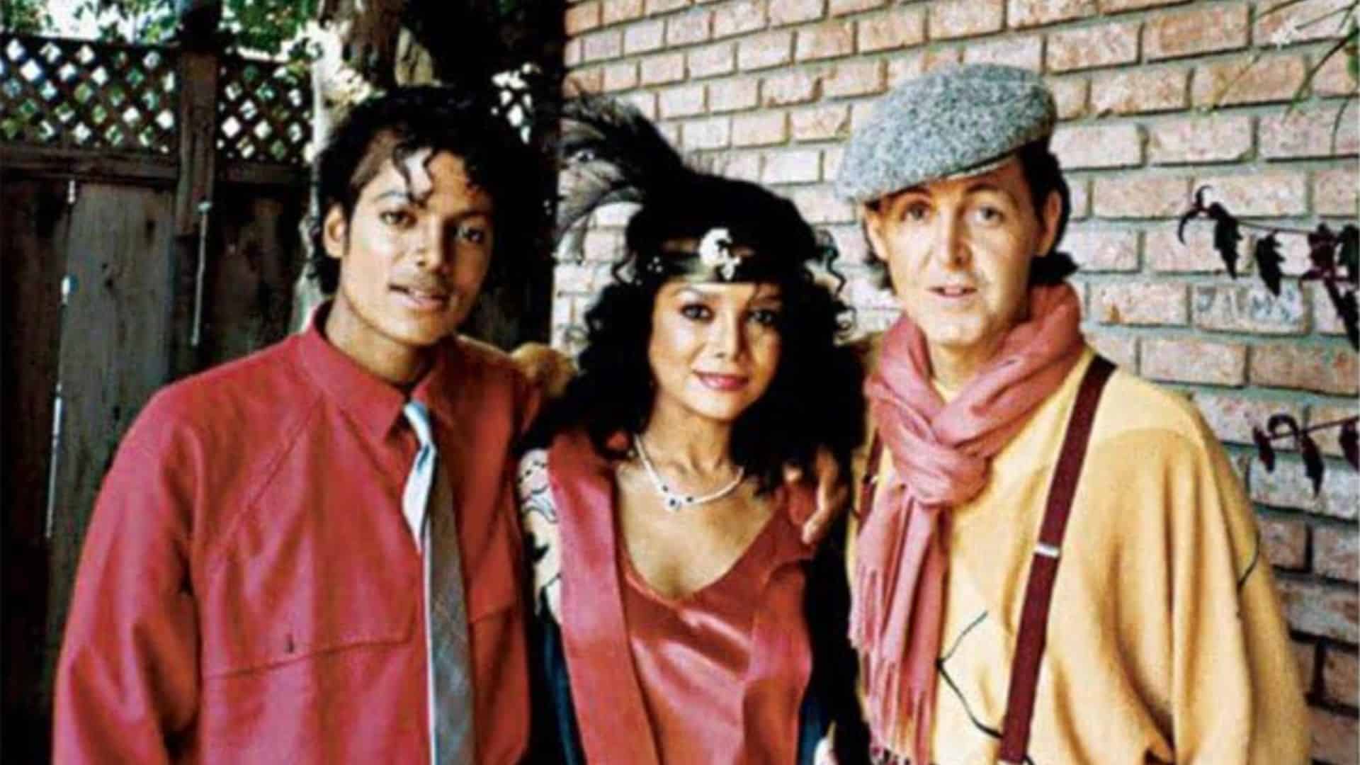 michael jackson and paul mccartney posing together in a vintage music-related photograph.