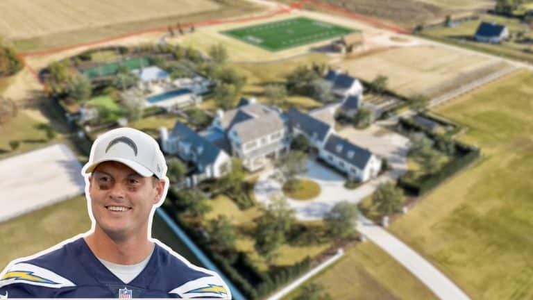 Philip River's pictured in front of a large residential estate with a football field nearby