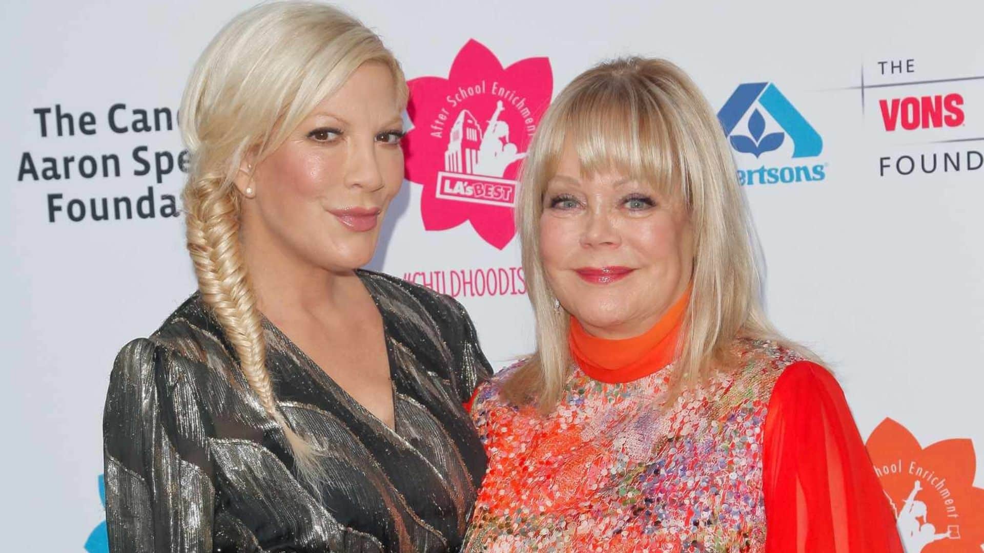 Tori Spelling and Candy Spelling posing together at an event for net worth comparison