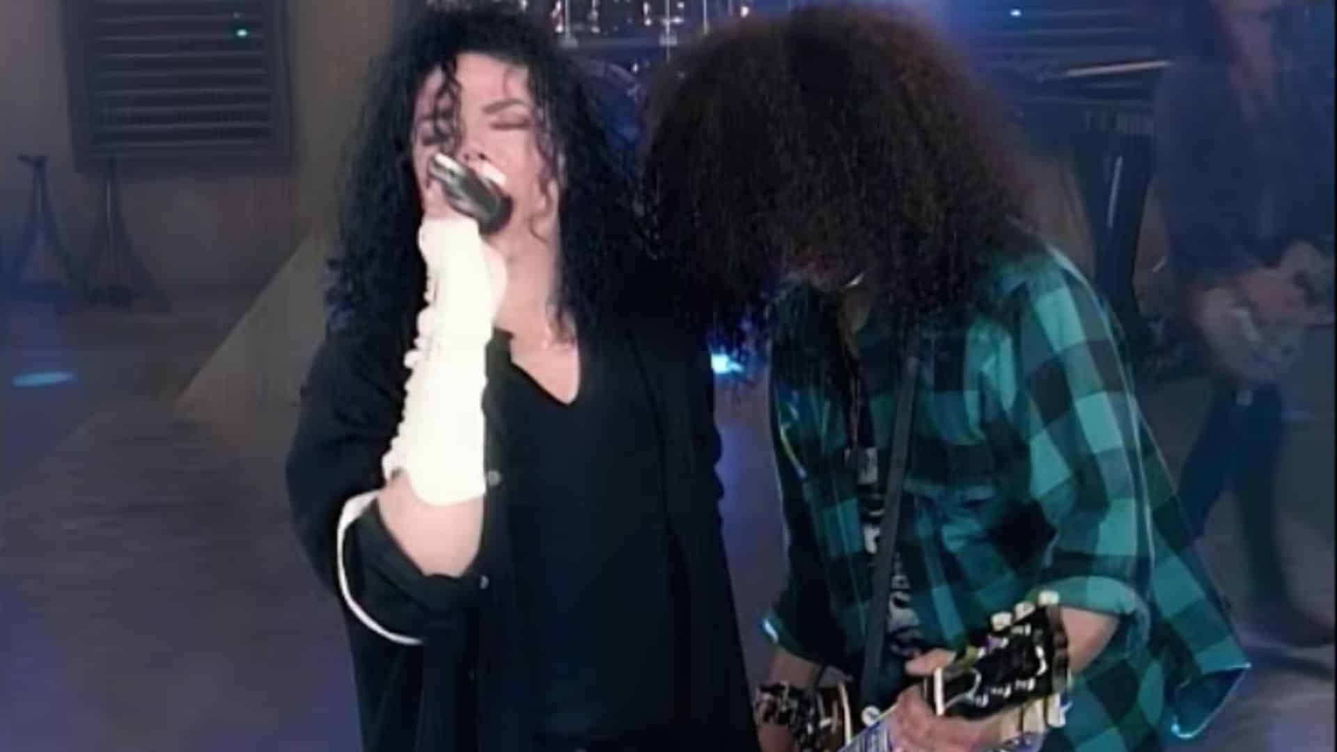 Two performers appearing together during a live music performance.
