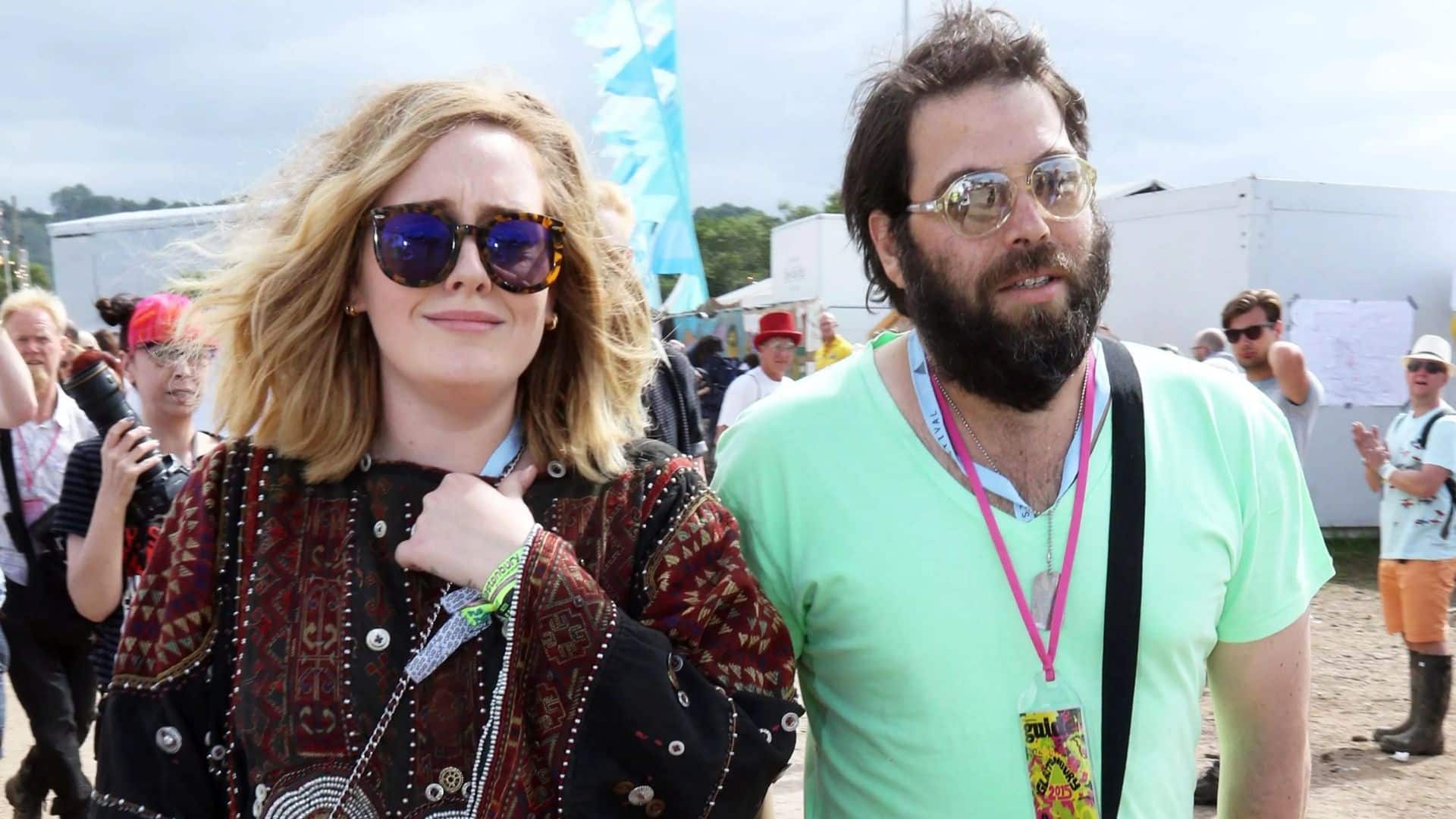 Adele and Simon Konecki wearing sunglasses at an outdoor music festival.