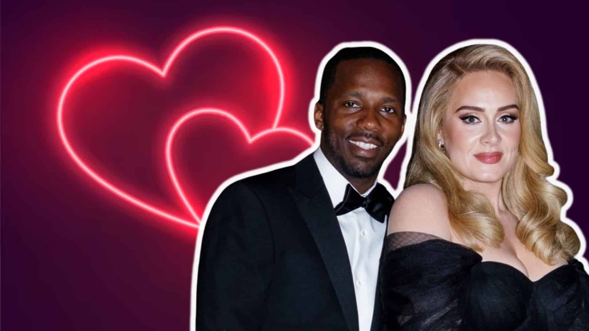 Adele and Rich Paul posing together in formal attire with neon hearts in the background.