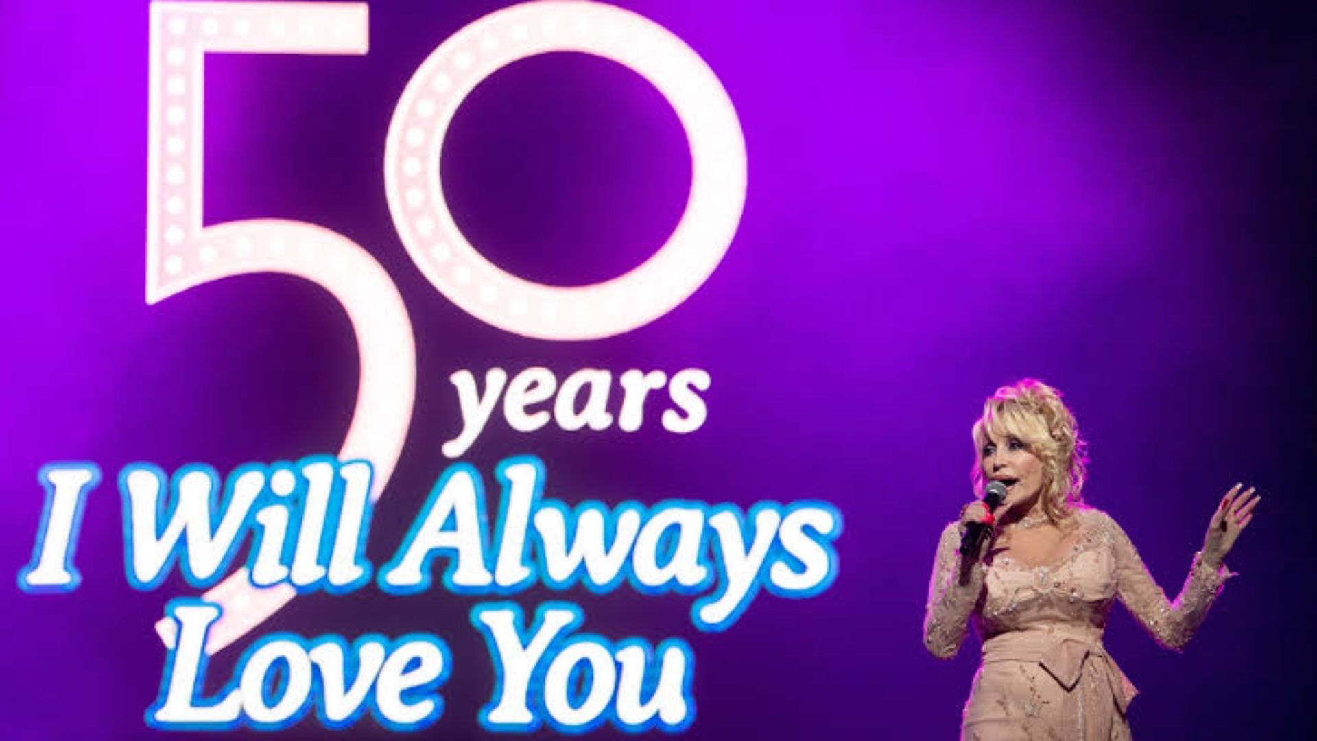 Dolly Parton performing at the 50th anniversary celebration of “I Will Always Love You.