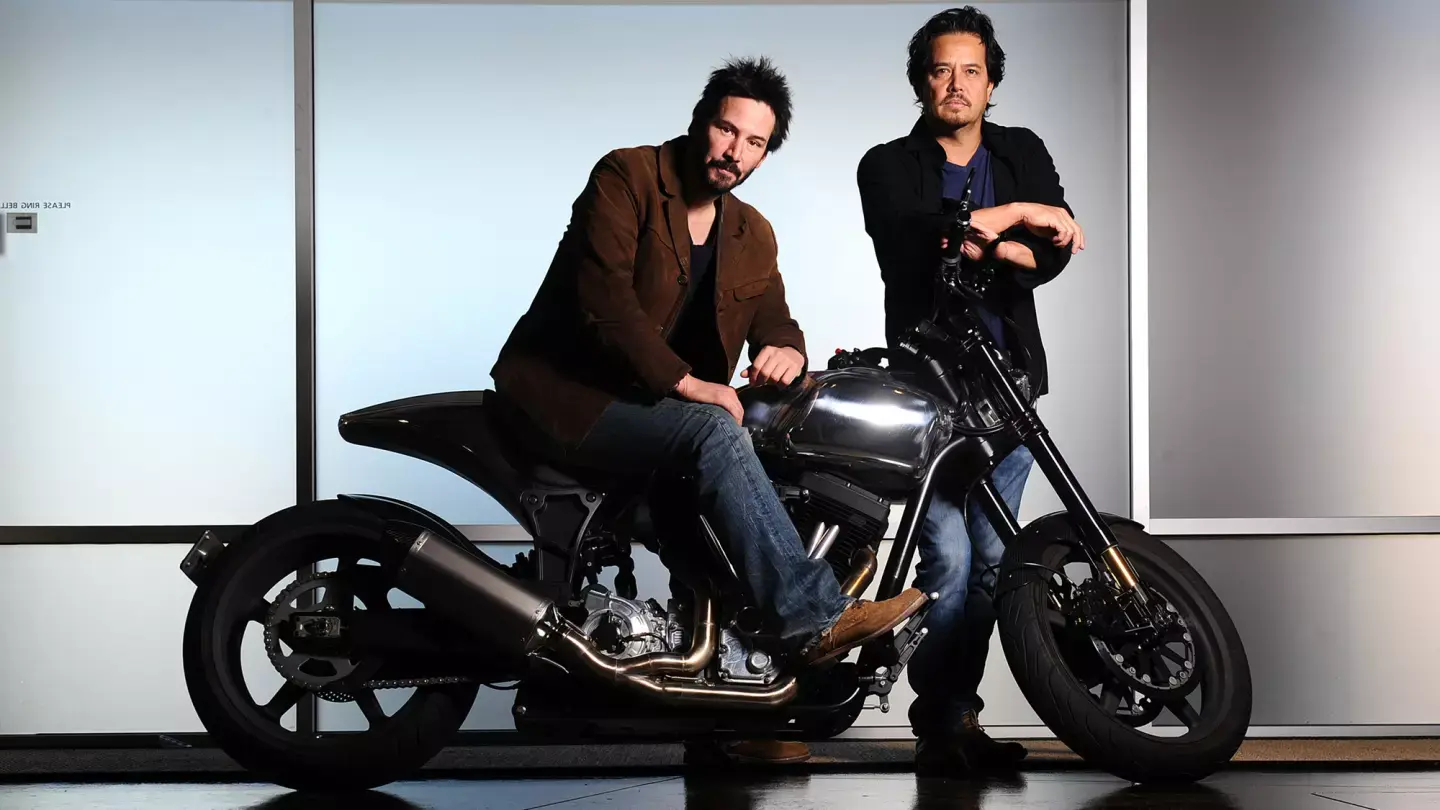 Keanu Reeves sitting on a custom Arch motorcycle alongside co-founder Gard Hollinger.