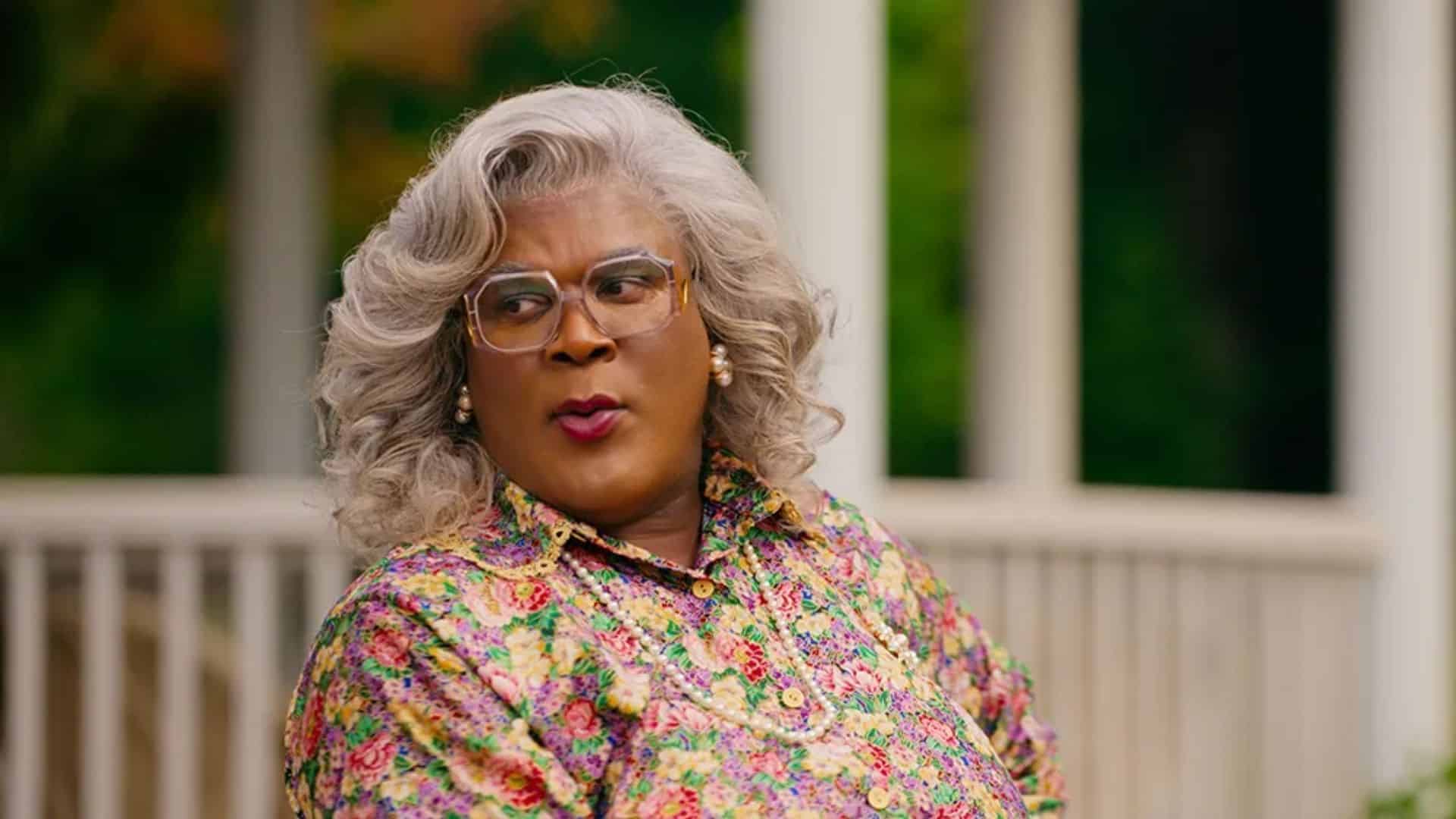 Madea character played by Tyler Perry in a floral outfit and glasses