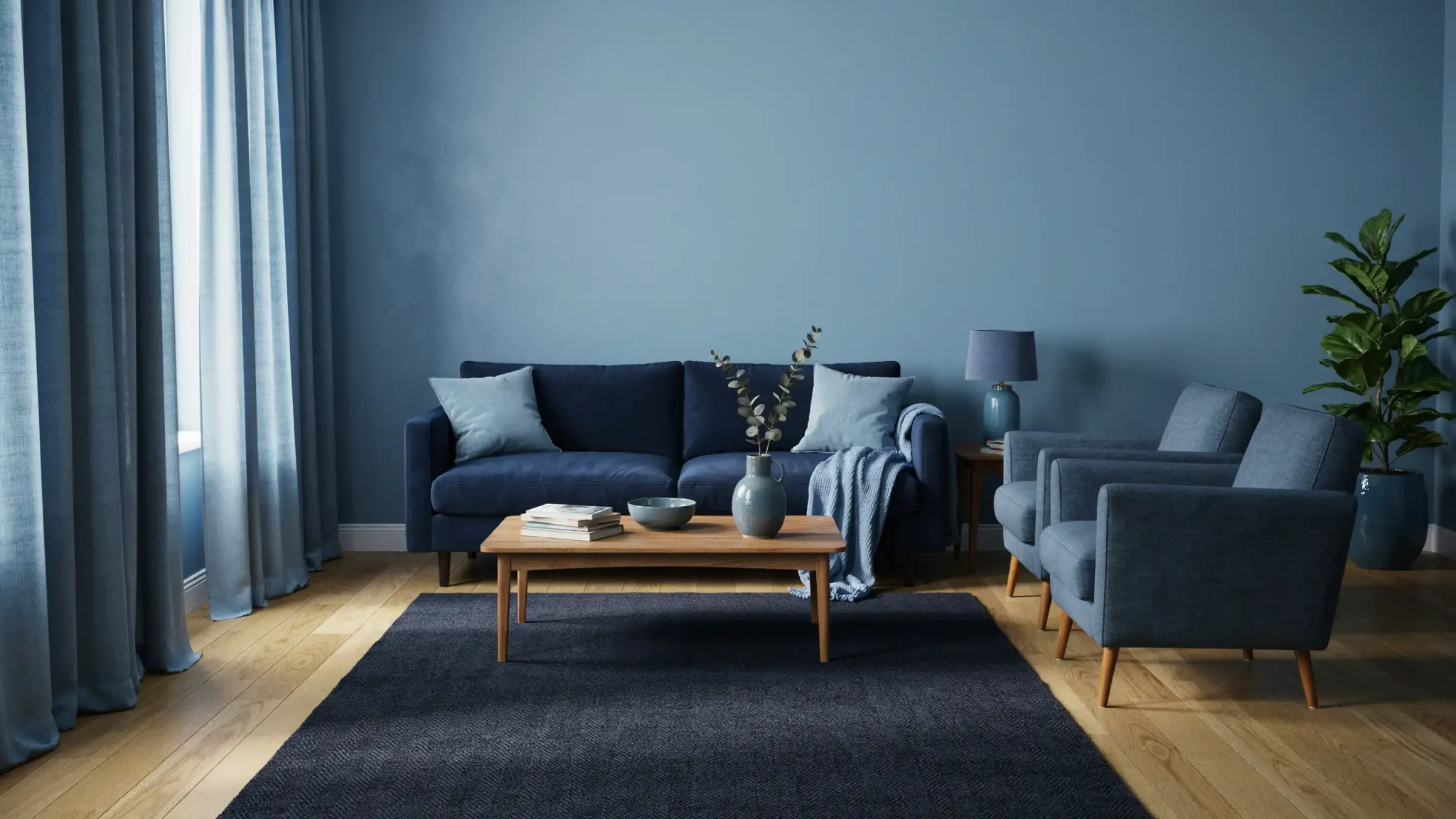 Monochromatic blue living room featuring layered tints, tones, shades, and coordinated furnishings.