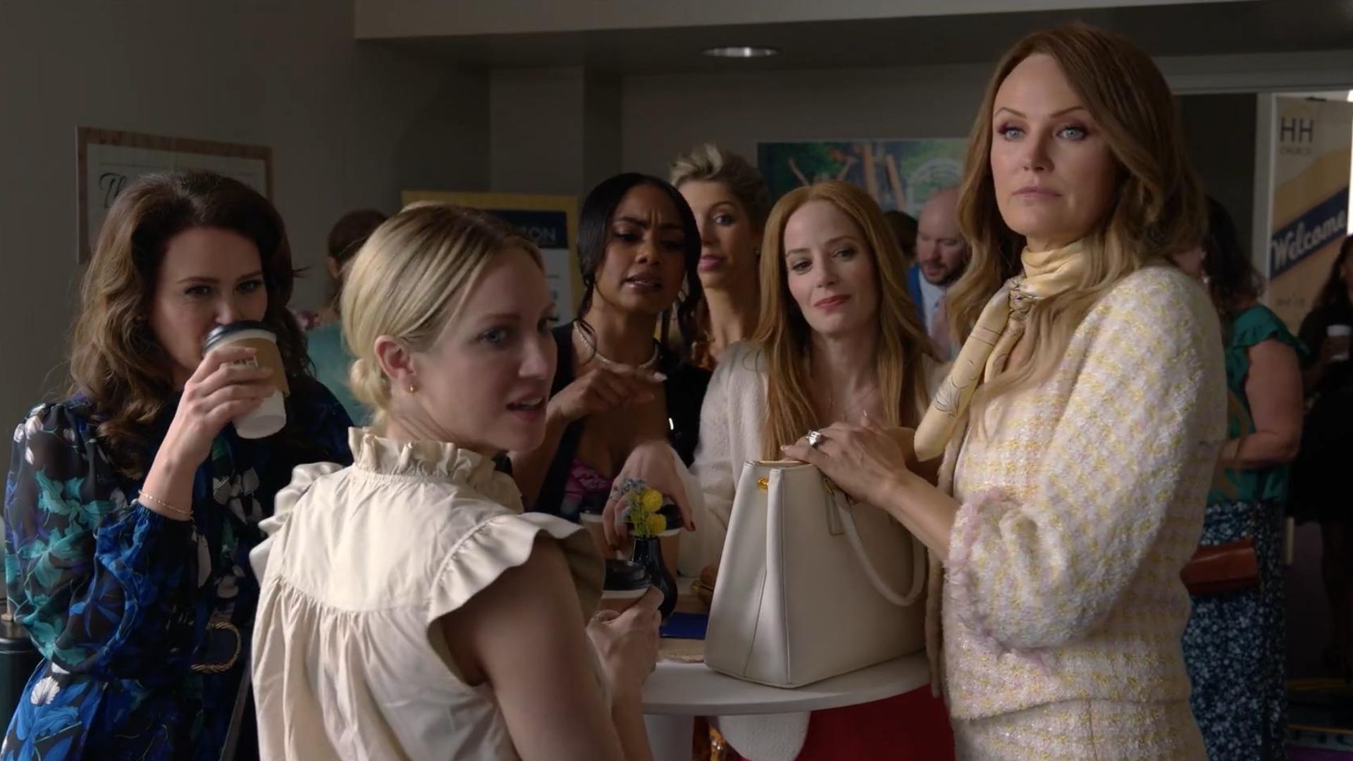 The Hunting Wives characters gathering at a social event